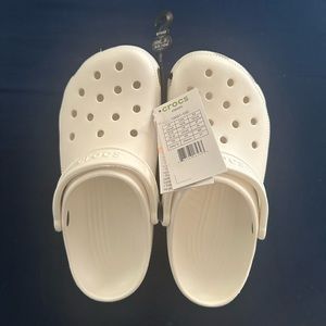 Crocs clogs, brand new with tags. Women’s size 8, men's size 6.